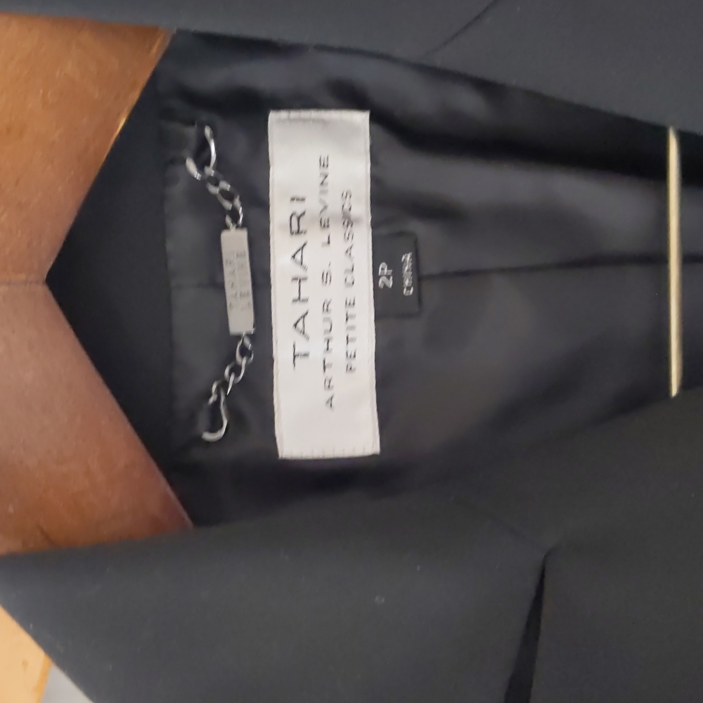 Tahari Women's black suit. Worn once. Pants NWT